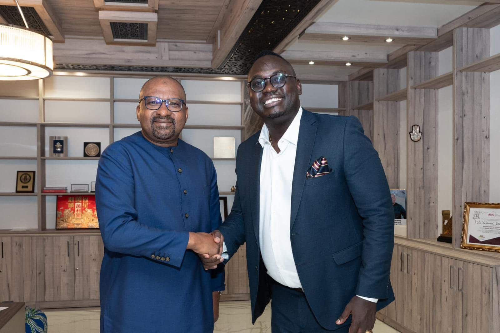 Stephen Ochieng Nyandiare with the Vice President of Sierra Leone